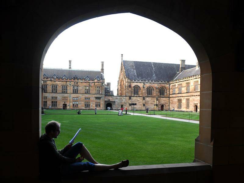 Universities are shedding staff as they deal with the financial fallout from foreign student cuts. Photo: Paul Miller/AAP PHOTOS Universities are shedding staff as they deal with the financial fallout from foreign student cuts. Photo: Paul Miller/AAP PHOTOS